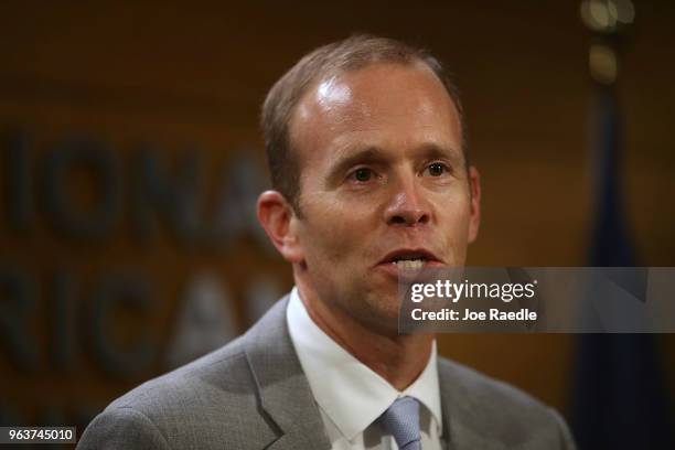 Brock Long, FEMA's director, speaks to the media during a visit to the National Hurricane Center on May 30, 2018 in Miami, Florida. Mr. Long urged...