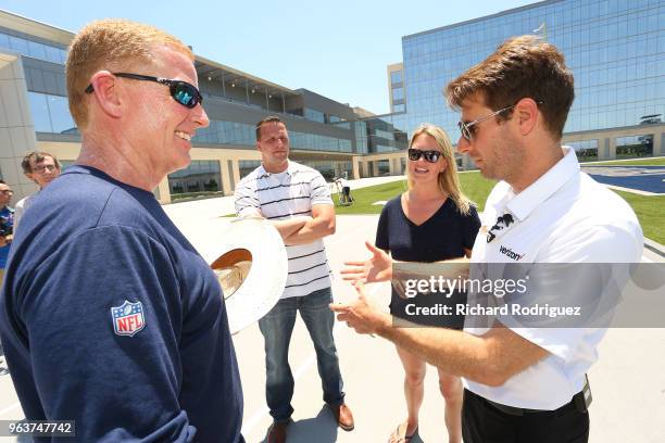 Dallas Cowboys head coach Jason Garrett visits with reigning Indianapolis 500 Champion Will Power, his wife Liz and brother-in-law Billy Cannon after...