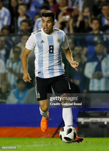 Marcos Acuña of Argentina drives the ball during an international friendly match between Argentina and Haiti at Alberto J. Armando Stadium on May 29,...