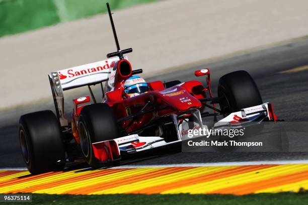 Fernando Alonso of Spain and Ferrari drives the new F10 for the first time during winter testing at the Ricardo Tormo Circuit on February 3, 2010 in...