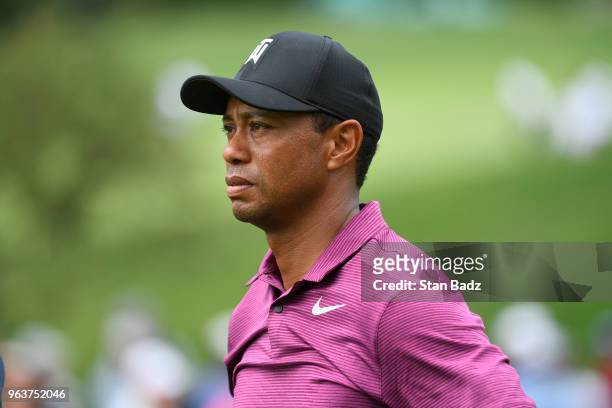 Tiger Woods watches play on the 18th hole during the Pro-Am round to the Memorial Tournament presented by Nationwide at Muirfield Village Golf Club...