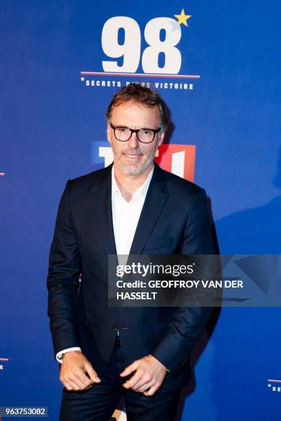 Former French football player Laurent Blanc poses as he arrives to attend the premiere of the television documentary film "98 secrets d'une victoire"...