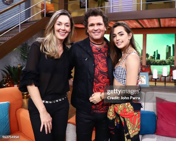 Claudia Elena Vasquez, Carlos Vives and Lucia Vives visit Univision's "Despierta America" at Univision Studios on May 30, 2018 in Miami, Florida.