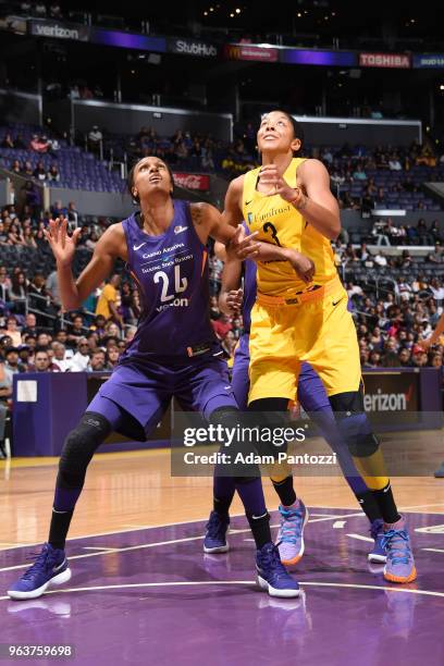 DeWanna Bonner of the Phoenix Mercury and Candace Parker of the Los Angeles Sparks box out during the game between the two teams on May 27, 2018 at...