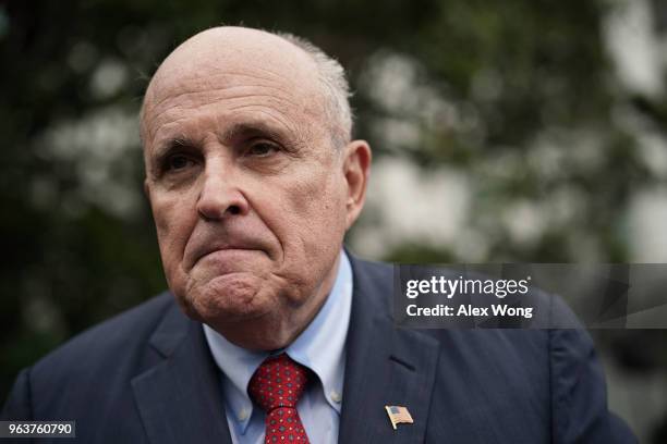 Rudy Giuliani, former New York City mayor and current lawyer for U.S. President Donald Trump, speaks to members of the media during a White House...
