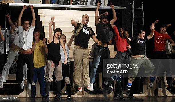 By ALEKSANDRA NIKSIC - Actors perform on stage at the Atelje 212 theatre in Belgrade during a rehersal on January 20, 2010. "Hair" will make its...