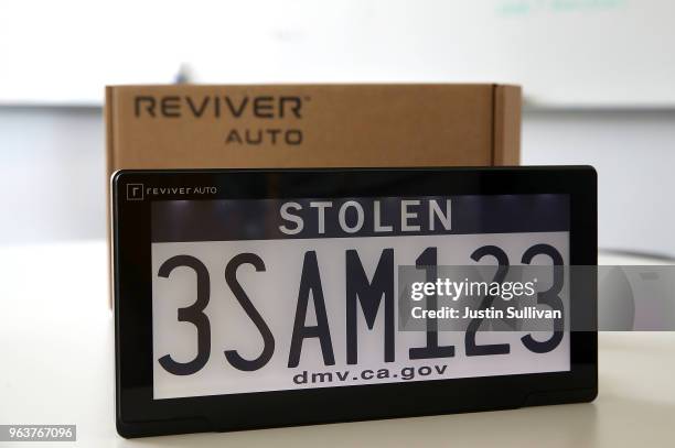 Digital license plate made by Bay Area company Reviver Auto, part of a pilot project with the state Department of Motor Vehicles, is displayed at...