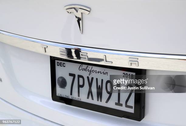 Digital license plate made by Bay Area company Reviver Auto, part of a pilot project with the state Department of Motor Vehicles, is displayed on...