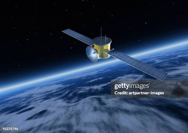 satellite with solar panels above earth  - satellite orbiting stock pictures, royalty-free photos & images