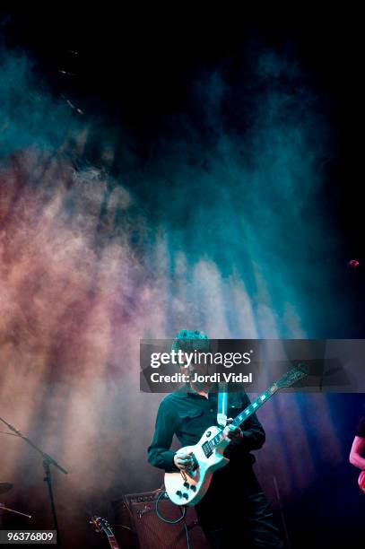 Dean Wareham performs on stage with Britta Phillips during Day 3 of Tanned Tin Festival 2010 at Teatro Principal on January 30, 2010 in Castellon de...