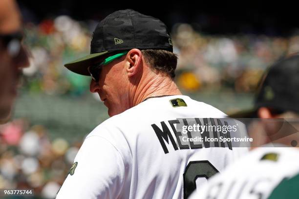 Oakland skipper Bob Melvin watches the instant replay during the inter-league game between the Arizona Diamondbacks and the Oakland A's played on May...