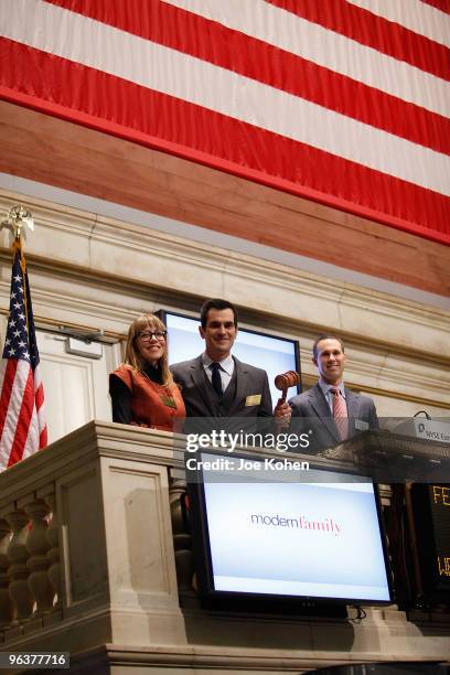 Actor Ty Burrel and his wife Holly Burrell ring the opening bell at the New York Stock Exchange on February 3, 2010 in New York City.