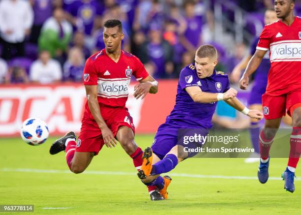 Orlando City forward Chris Mueller shoots on goal during the MLS soccer match between the Orlando City and the Chicago Fire on May 26th, 2018 at...