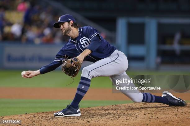 San Diego Padres relief pitcher Adam Cimber shows his unusual pitching delivery while pitching in relief for the Padres in the game between the San...