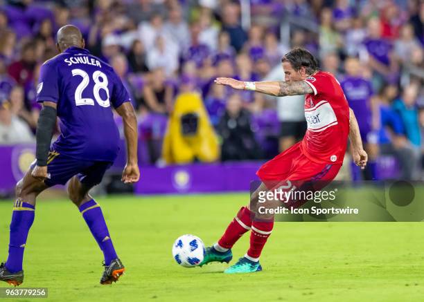 Chicago Fire forward Alan Gordon shoots and scores the Chicago Fire 2nd goal during the MLS soccer match between the Orlando City and the Chicago...