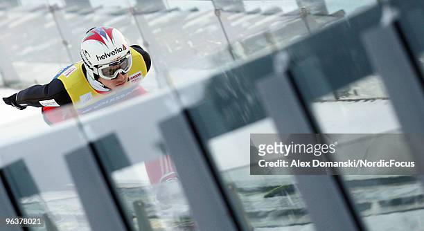 Simon Ammann of Switzerland competes during the trial round of the FIS Ski Jumping World Cup on February 3, 2010 in Klingenthal, Germany.