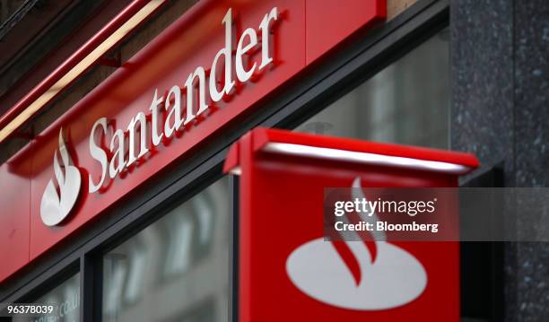 Sign hangs from a branch of Banco Santander in London, U.K., on Wednesday, Feb. 3, 2010. Banco Santander announce FY earnings tomorrow. Photographer:...