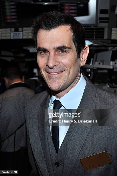 Actor Ty Burrell poses for pictures after ringing the opening bell at the New York Stock Exchange on February 3, 2010 in New York City.