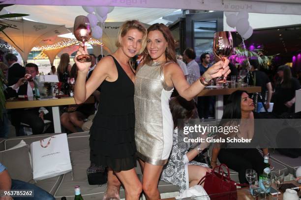 Giulia Siegel and Simone Ballack during the opening of H'ugo's Wine & Champagne bar on May 30, 2018 in Munich, Germany.