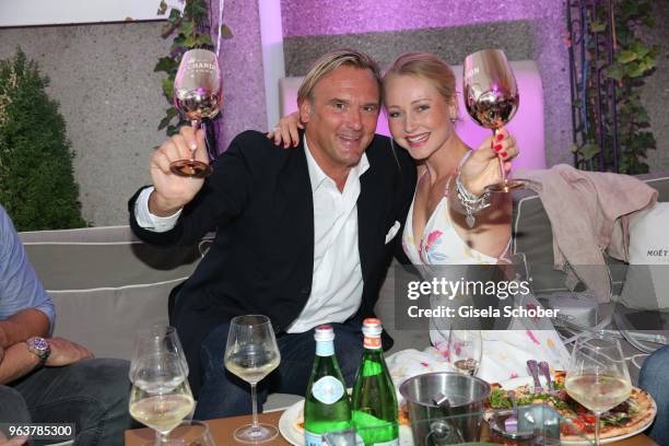 Gregor Leutgeb and his wife Victoria Leutgeb during the opening of H'ugo's Wine & Champagne bar on May 30, 2018 in Munich, Germany.