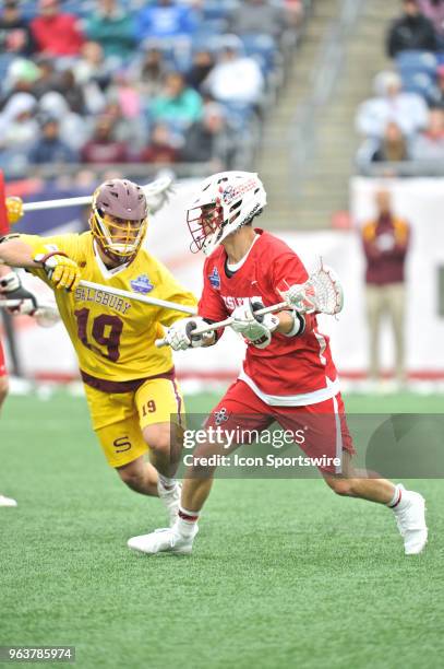 Salisbury midfielder Troy Miller tries to block the shot on net. During the Salisbury Sea Gulls game against Wesleyan Cardinals at Gillette Stadium...