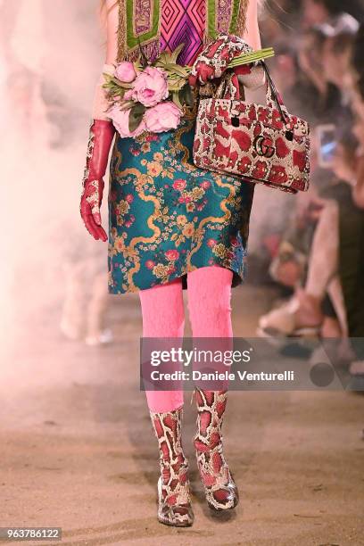 Model, fashion detail, walks the runway at the Gucci Cruise 2019 show at Alyscamps on May 30, 2018 in Arles, France.