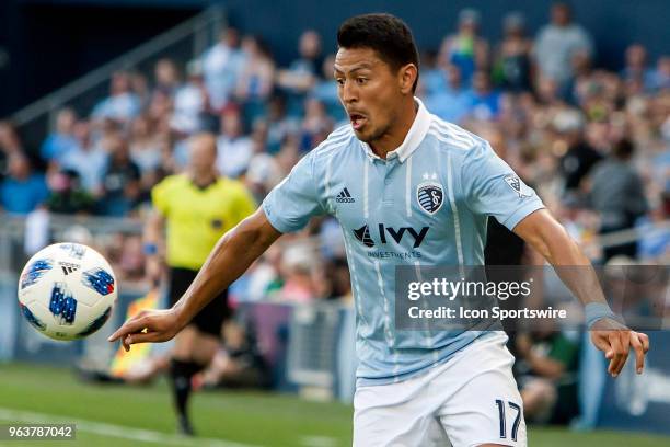 Sporting Kansas City midfielder Roger Espinoza gets in front of the ball in order to control it during the MLS regular season match between Sporting...