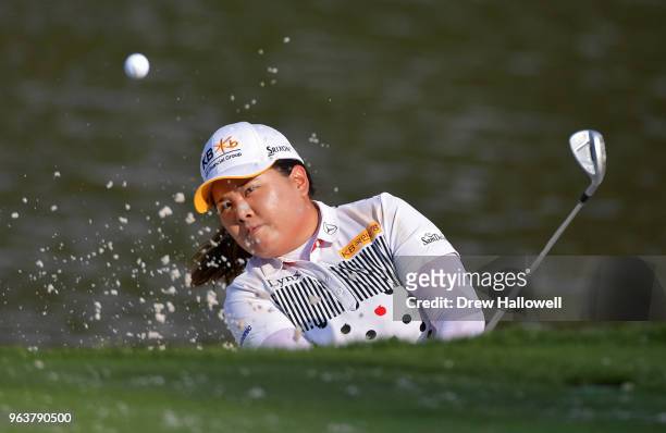 Inbee Park of Korea plays a bunker shot on the 18th hole during a practice round prior to the 2018 U.S. Women's Open at Shoal Creek on May 30, 2018...