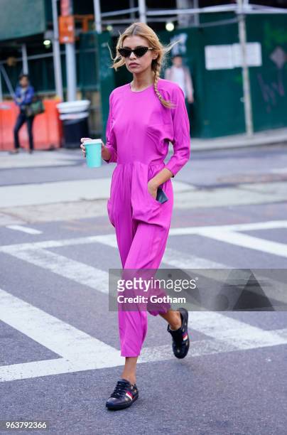 Stella Maxwell wears fuscia on May 30, 2018 in New York City.
