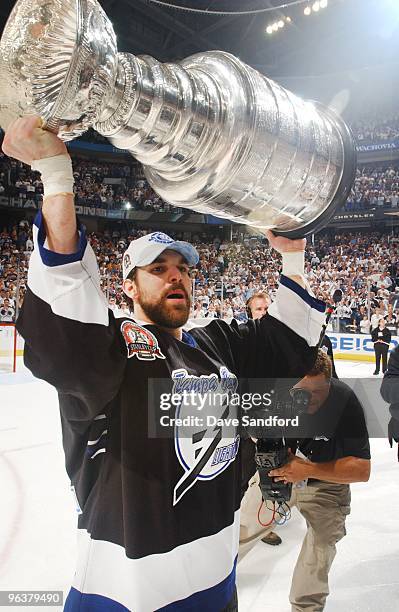 Dan Boyle of the Tampa Bay Lightning celebrates the Stanley Cup win against the Calgary Flames on June 7, 2004 at the St. Pete Times Forum in Tampa,...