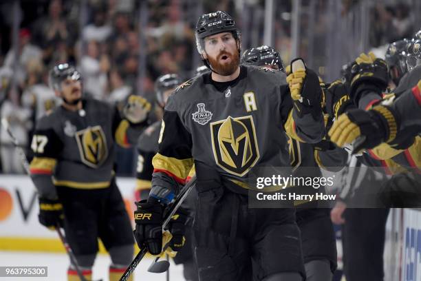 James Neal of the Vegas Golden Knights is congratulated by his teammates at the bench after scoring a first-period goal against the Washington...