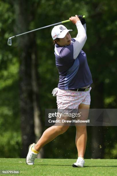 Shanshan Feng of China plays a shot on the 14th hole during a practice round prior to the 2018 U.S. Women's Open at Shoal Creek on May 30, 2018 in...