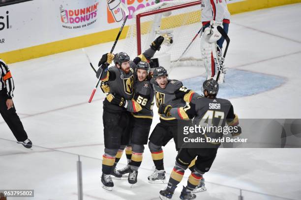 James Neal celebrates his goal with teammates Luca Sbisa, David Perron and Erik Haula of the Vegas Golden Knights against the Washington Capitals in...