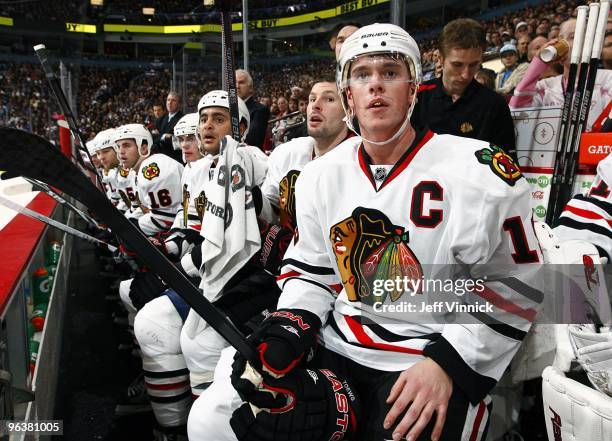 Jonathan Toews of the Chicago Blackhawks looks on from the bench during their game against the Vancouver Canucks at General Motors Place on January...