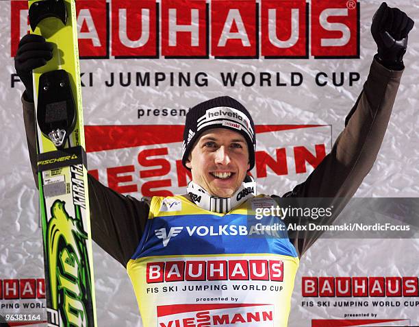 Simon Ammann celebrates after winning the FIS Ski Jumping World Cup on February 3, 2010 in Klingenthal, Germany.