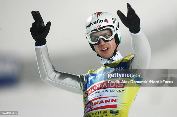 Simon Ammann celebrates after winning the FIS Ski Jumping World Cup on February 3, 2010 in Klingenthal, Germany.