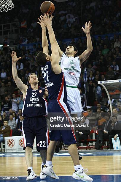 Nikos Zisis, #6 of Montepaschi Siena competes with and Bostjan Nachbar, #21 of Efes Pilsen Istanbul competes with in action during the Euroleague...