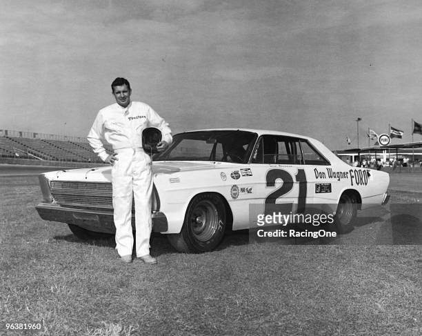 Jack Bowsher of Springfield, Ohio, poses with his 1966 Ford before the '66 ARCA 250. Bowsher won his qualifying race then took the victory in the...