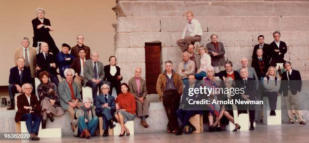 Group portrait of a large group of artists as they pose in front of the Temple of Dendur in the Metropolitan Museum of Art, New York, New York,...