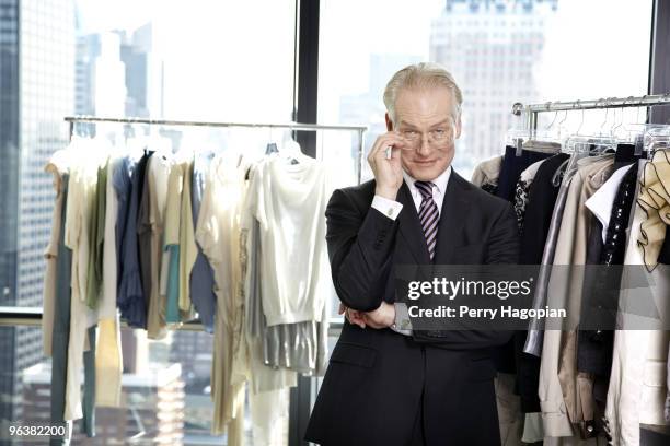 Fashion guru, Tim Dunn poses at a portrait session for Marie Claire Magazine on August 14, 2009 in New York City.