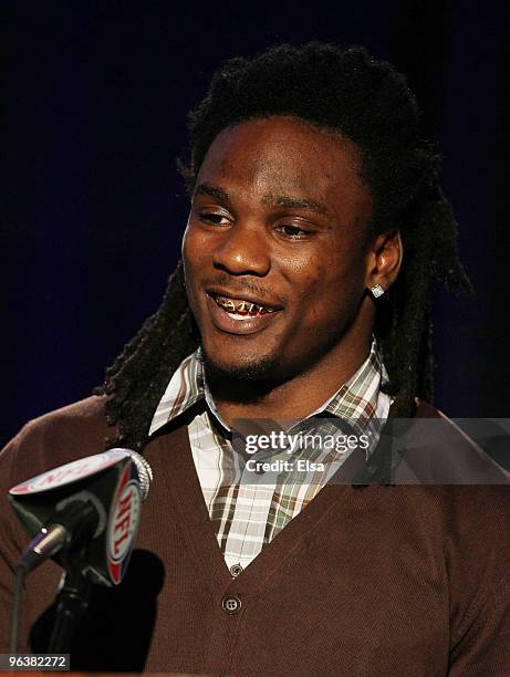 Chris Johnson of the Tennessee Titans accepts his ground award during the FedEx Air & Ground NFL Players of the Year Press Conference on February 3,...