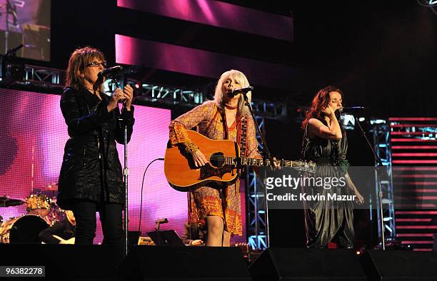 Lucinda Williams, Emmylou Harris and Patty Griffin performs at 2010 MusiCares Person Of The Year Tribute To Neil Young at the Los Angeles Convention...