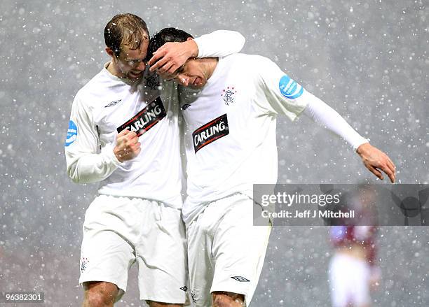 Lee McCulloch of Rangers celebrates after scoring their second goal with Steven Whittaker during the Co-operative Insurance Cup Semi Final between...