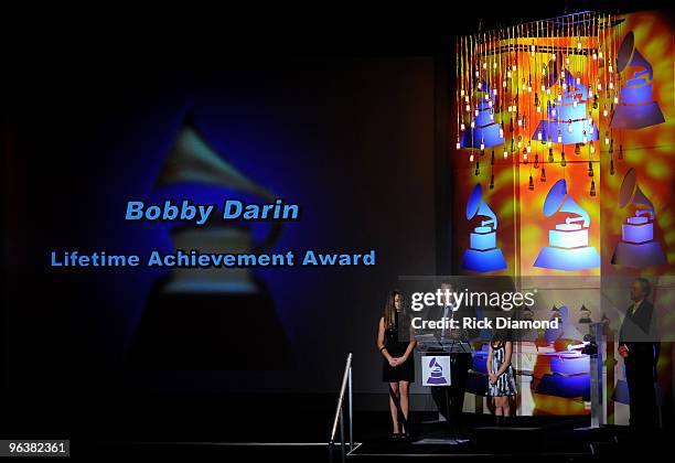 Alexa Darin, Dodd Darin and Olivia Darin accept the Lifetime Achievement Award on behalf of the late Bobby Darin at the Special Merit Awards and...