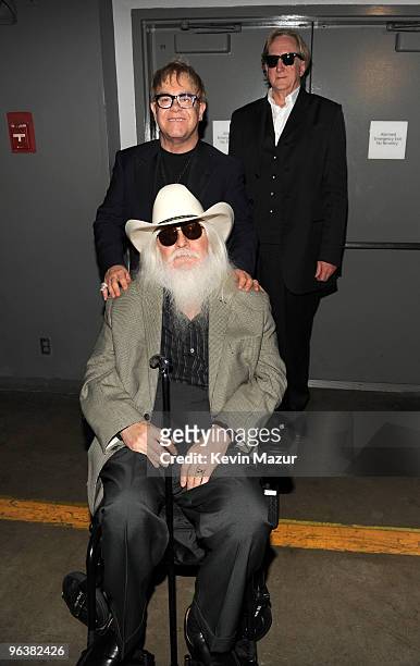 Leon Russell, Elton John and T-Bone Burnett backstage at 2010 MusiCares Person Of The Year Tribute To Neil Young at the Los Angeles Convention Center...