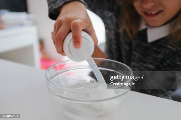 making slime - thick girls stock pictures, royalty-free photos & images