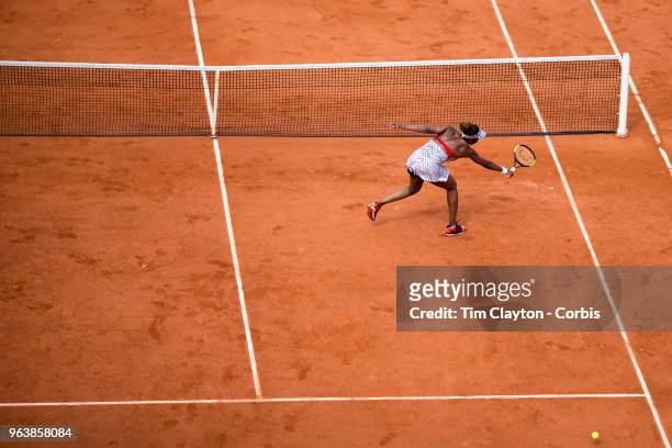 French Open Tennis Tournament - Day One. Venus Williams of the United States is passed by a shot during her loss to Wang Qiang of China on Court...