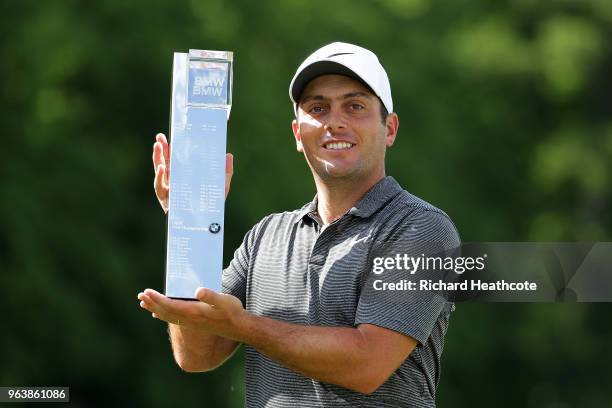 Francesco Molinari of Italy holds the trophy after victory in the final round of the BMW PGA Championship at Wentworth on May 27, 2018 in Virginia...