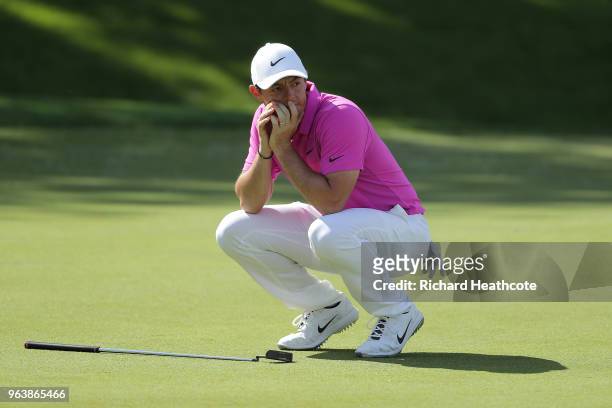 Rory McIlroy of Northern Ireland reacts to a missed eagle putt on the 18th green during the final round of the BMW PGA Championship at Wentworth on...