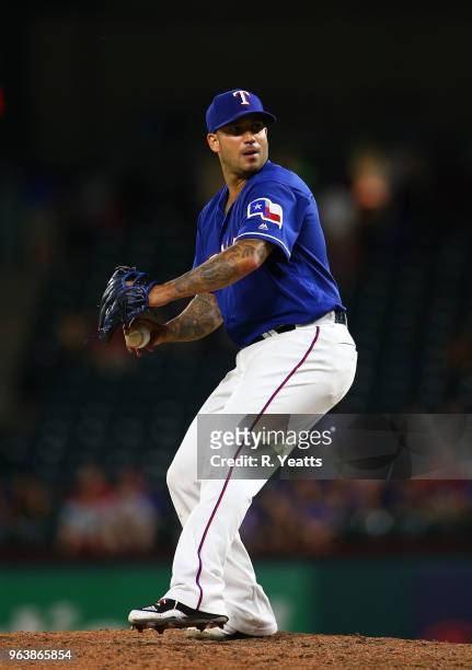 Matt Bush of the Texas Rangers throws in the ninth inning against the Kansas City Royals at Globe Life Park in Arlington on May 24, 2018 in...